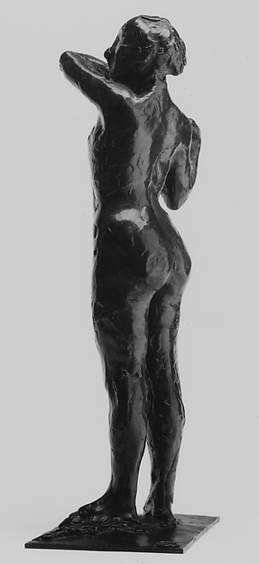 Dancer Adjusting the Shoulder Strap of Her Bodice